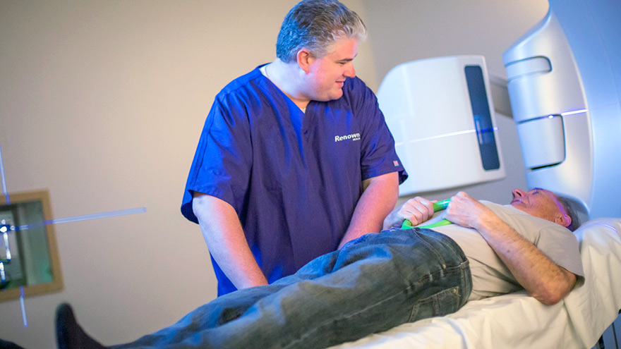 Patient at imaging appointment speaking with imaging technician